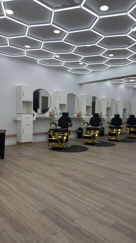 Luxury barbershop interior with warm lighting